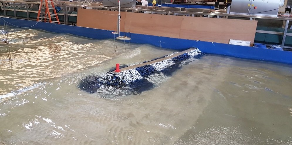 Physical model testing of the proposed lengthened breakwater